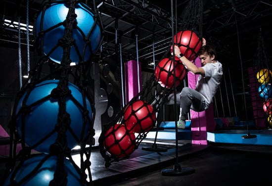 Ninja warrior course a Trampoline park polygon where visitors embark on a journey through a series of intricate and diverse courses. - Akrobat